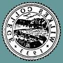 A black-and-white representation of the Wilkes College seal.